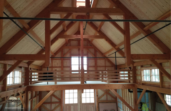 Timber Frame Barn Interior Loft Truss and Steel Rods Ceiling