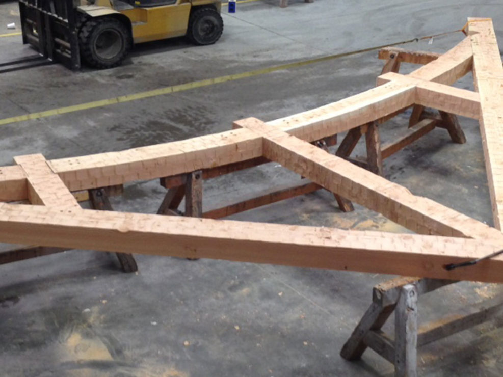 Rough Hewn Timber Frame Arched Chord Truss Assembly