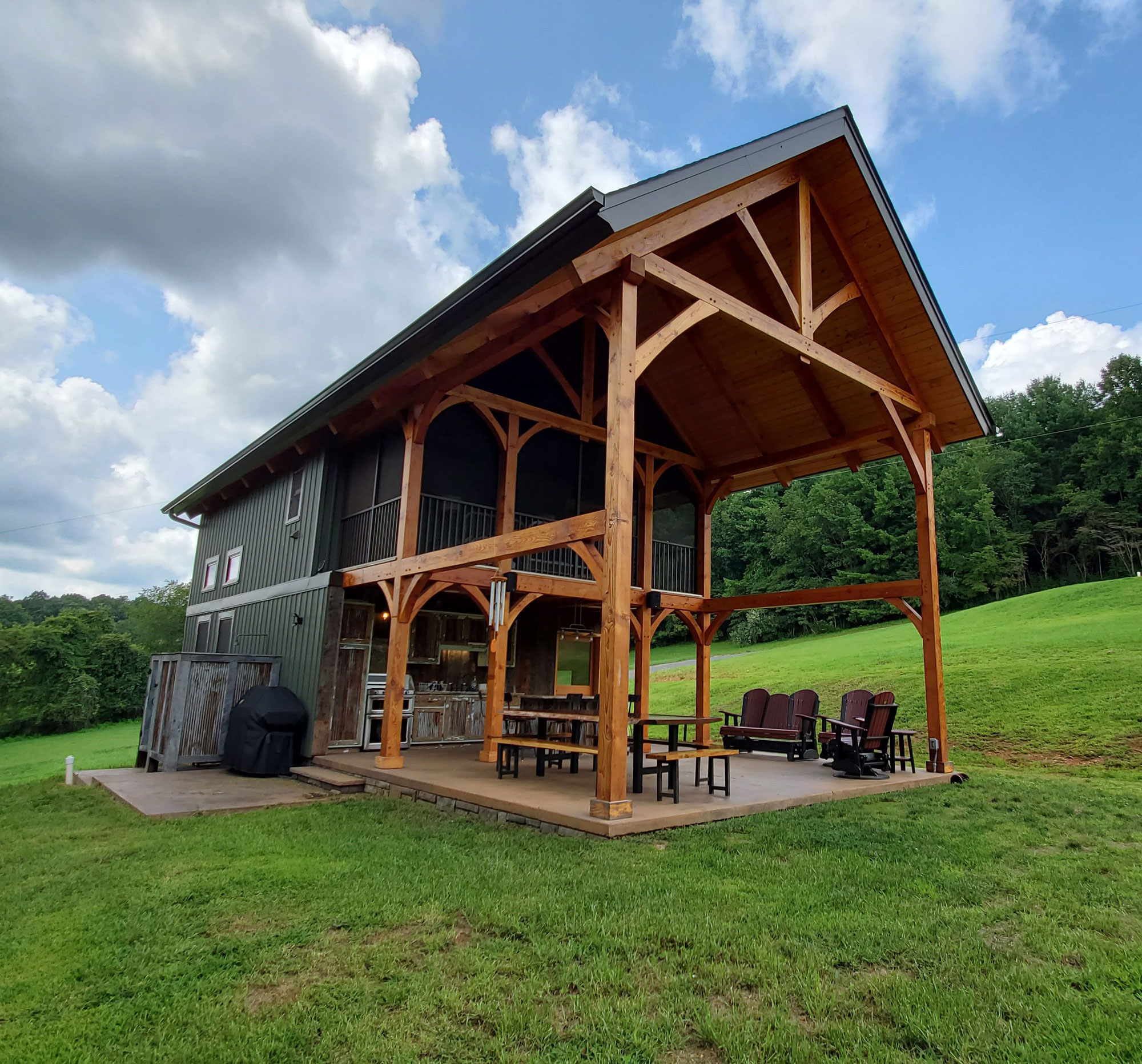 Timber Frame Home Pavilion with King Post Truss and curved struts