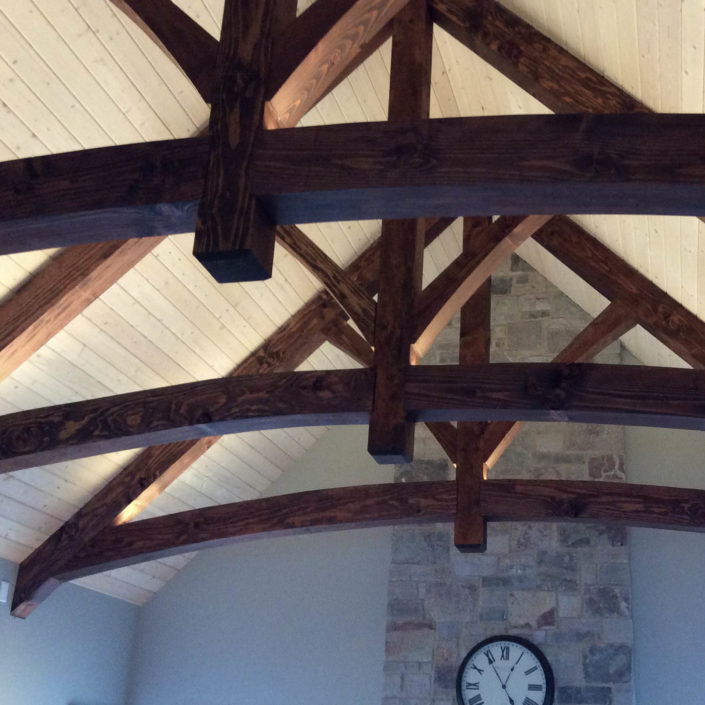 Arched Raised Chord King Post Truss