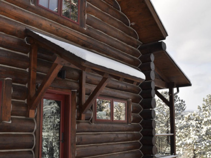 Timber Frame Log Cabin Exterior in Snow - Detail