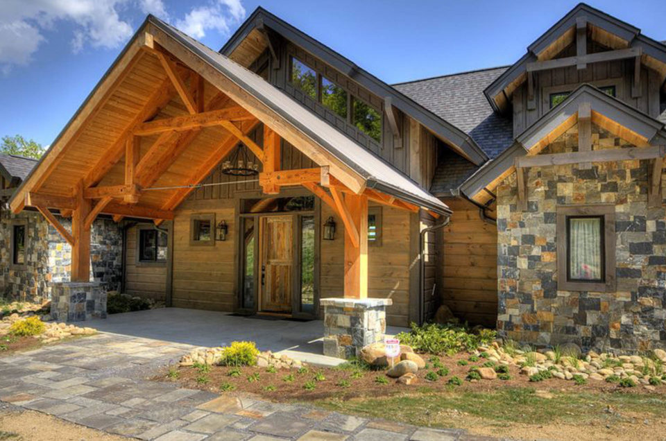 Timber Frame Home Entryway with Hammerbeam Truss