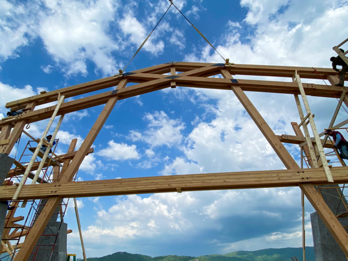 Huge timber frame trusses span the amenity center a The Summit at Echota Resort in NC.